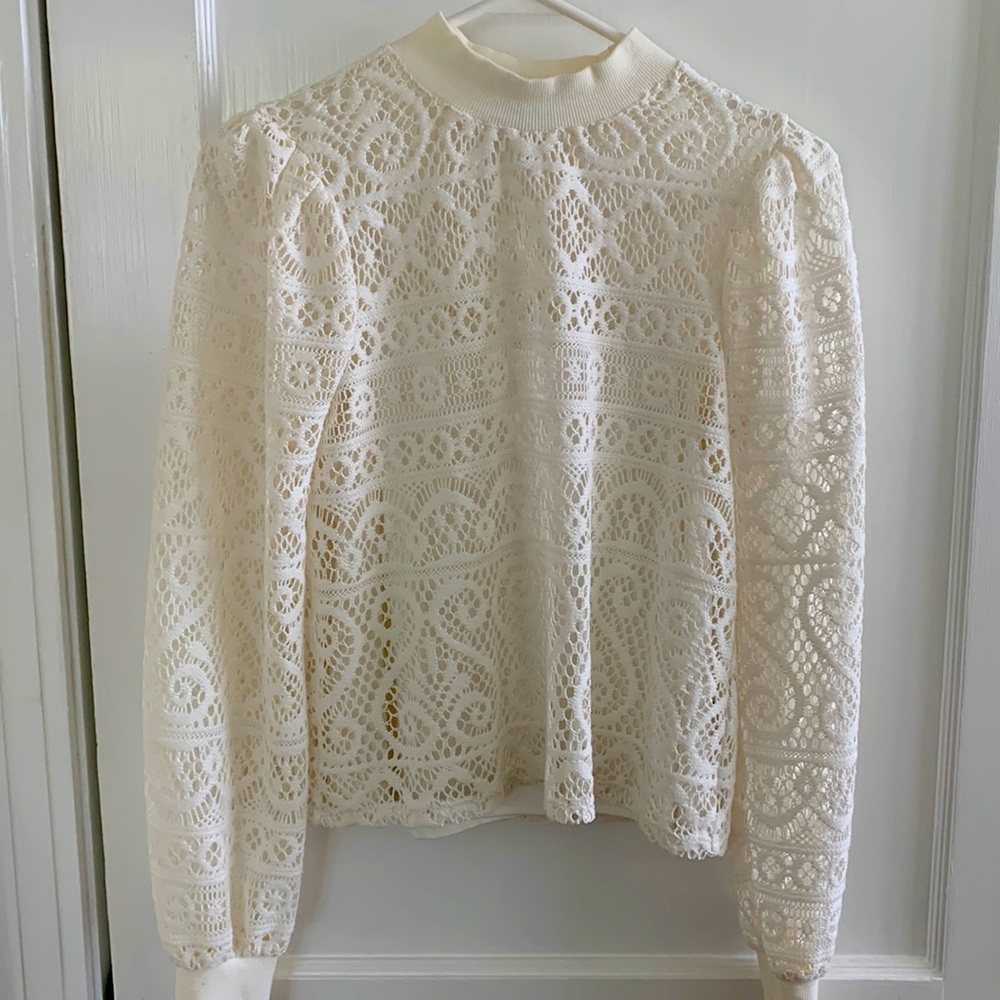 Ivory lace top.